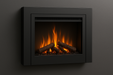 A modern wall-mounted electric fireplace with a black metal frame and glowing ceramic logs, mounted on a dark gray wall. 